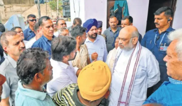 बाढ़ पीड़ितों से मिले शाह, राहत एवं पुनर्वास का दिया भरोसा